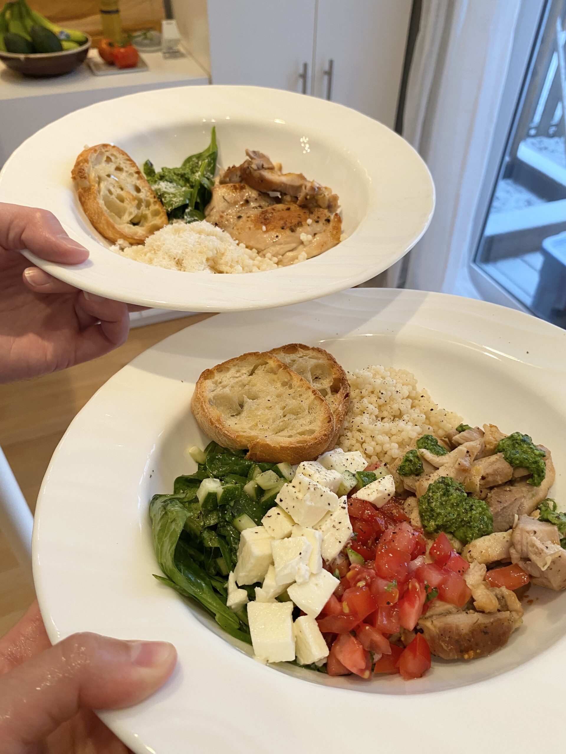 Bruschetta bowl served as a family-style meal with one bowl being packed with veggies and the other adapted to a picky eater's preferences and level of comfort